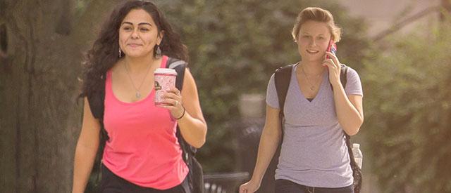 students walking across Carroll University's campus